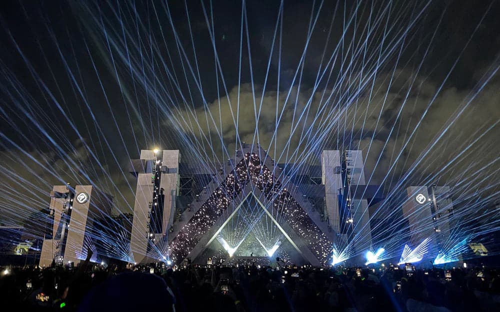 Blue laser beams fan across the Barbarella Festival stage and audience