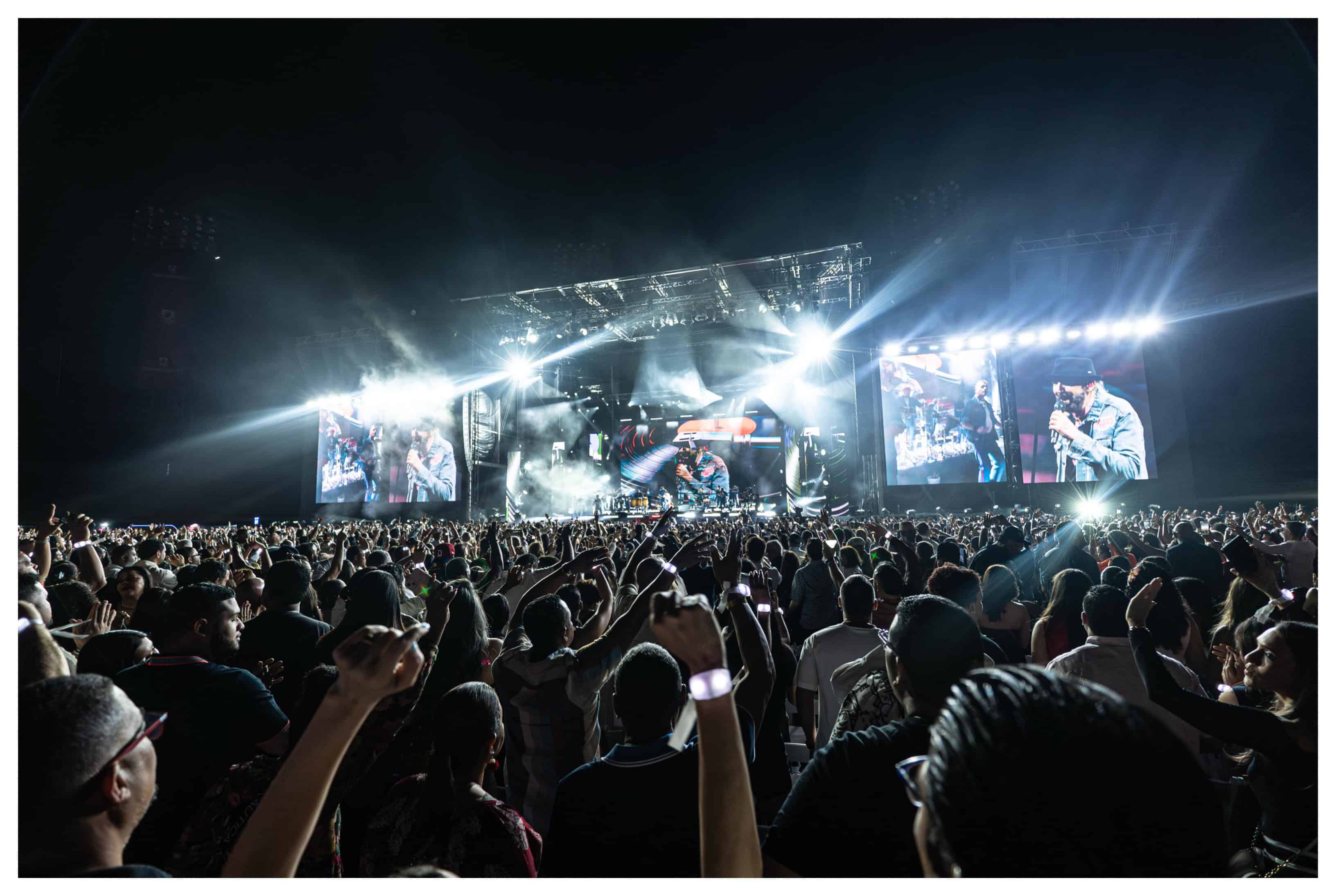 A full Estadio Cibao watches Juan Luis Guerra perform in Santiago